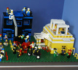 9 CUSTOM LEGO SETS (1911 pcs) WITH 58 NOW RARE RETIRED MINIFIGURES FROM LEGO TOWN (1978-2010). BUILDS: HOSPITAL, AMBULANCE, HELICOPTER, SUNSHINE CAFE, FLORIST, HOT DOG STAND, POST OFFICE, CRANE, POLICE VEHICLES, TRUCKS, ROAD, SO MANY ACCESSORIES (KIT 12)