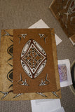 Rare Tapa Bark Cloth (Kapa in Hawaii), from Lake Sentani, Irian Jaya, Papua New Guinea. Hand painted by a Tribal Artist with natural pigments: Spiritual Stylized Shield Motifs 21 1/2" x 13" (no 22)
