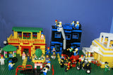 9 CUSTOM LEGO SETS (1911 pcs) WITH 58 NOW RARE RETIRED MINIFIGURES FROM LEGO TOWN (1978-2010). BUILDS: HOSPITAL, AMBULANCE, HELICOPTER, SUNSHINE CAFE, FLORIST, HOT DOG STAND, POST OFFICE, CRANE, POLICE VEHICLES, TRUCKS, ROAD, SO MANY ACCESSORIES (KIT 12)