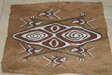 Rare Tapa Bark Cloth (Kapa in Hawaii), from Lake Sentani, Irian Jaya, Papua New Guinea. Hand painted by a Tribal Artist with natural pigments: Spiritual Stylized Motifs of shields with eyes & fish. 21" x 17" (no 28)