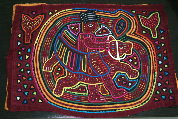 Kuna Indian Folk Art Mola Blouse Panel from San Blas Islands, Panama. Handstitched Reverse Applique: Conquistador Riding a Flying Horse While Blowing His Horn 16.75
