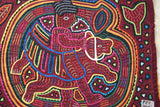 Kuna Indian Folk Art Mola Blouse Panel from San Blas Islands, Panama. Handstitched Reverse Applique: Conquistador Riding a Flying Horse While Blowing His Horn 16.75" x 12.5" (40A)