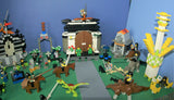 CUSTOM LEGO SET WITH 1751 PCS AND 37 NOW RARE RETIRED MINIFIGURES, 12 ANIMALS INCLUDING HORSES & DINOSAURS, 5 BUILDS: CASTLE, FORTRESS, TOWERS, WINDMILL, TIME MACHINE, ROBOT VEHICLE, TOMBS, FOUNTAIN, ROAD (KIT 24)