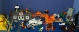 8 LEGO ALPHA TEAM NOW RARE RETIRED MINIFIGURES: CRUNCH WITH DYNAMITE TORSO, CHARGE, CAM GIRL, RADIA, OGEL MINION COMMANDER WITH SKELETON FACE, ETC... PLUS 2 BUILDS:  THRONE, ARMORED VEHICLE (111 PCS) ITEM 58