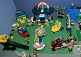 CUSTOM LEGO SET WITH OVER 12 BUILDS: 1488 PCS, 25 NOW RARE RETIRED MINIFIGURES. ENTRANCE ARCH, AMUSEMENT PARK, RIDES & GAMES, POLICE QUARTERS, PUBLIC RESTROOMS, FOUNTAIN, MANY ACCESSORIES. kit 23