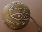 BETEL PARAPHERNALIA: ETHNIC VERY RARE PRIMITIVE LIME GOURD, HAND PAINTED TRADITIONAL MOTIFS CREATED WITH NATURAL PIGMENTS (CHARCOAL & LIME), COLLECTED ON THE PREMISES, LAKE SENTANI, WEST PAPUA, IRIAN JAYA, LATE 1900'S.