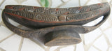 BETEL HABIT PARAPHERNALIA: UNIQUE RARE OLDER POLYCHROME COASTAL RAMU RIVER BETEL MORTAR, HAND CARVED, UNUSUAL CANOE SHAPED WITH BASE, COLOR PIGMENTS, NICE PATINA, COLLECTED IN THE FIELD, NEW GUINEA, MID 20TH CENTURY. 8” LONG