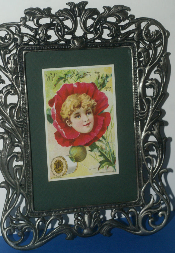 EPHEMERA AMERICANA ANTIQUE WHIMSICAL ART 1887 IN ORNATE FRAME & MATTED, ANTIQUE VICTORIAN ADVERTISING TRADE CARD OF POPPY GIRL: J.& P. Coats (DFPO2J) LACY METAL FRAME 8,5