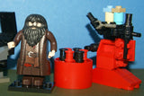 7 CUSTOM LEGO BUILDS, 2 NOW RARE (NEW) RETIRED LEGO MINIFIGURES, HAGRID hp111 & HARRY POTTER hp094 FROM SET 4738 “HAGRID’S HUT”, OUTDOOR LABORATORY, ELIXIR POT,  LOUNGE RECLINER, SEAT, COUCH, TABLE ETC… YEAR 2010, 86 PIECES TOTAL, ITEM 72.