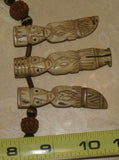 Unique Vintage Hand crafted Ethnic Glass Trade Beads, Rudhaccha Seeds & Seed Beads Necklace with 3 Buffalo Bone Hand Carved Pendants of Protective Ancestor Effigies for Good Luck, Health & Prosperity, Borneo, Indonesia NECK16 + 1 Flapper Coconut necklace.