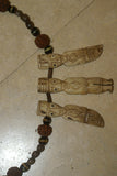 Unique Vintage Hand crafted Ethnic Glass Trade Beads, Rudhaccha Seeds & Seed Beads Necklace with 3 Buffalo Bone Hand Carved Pendants of Protective Ancestor Effigies for Good Luck, Health & Prosperity, Borneo, Indonesia NECK16 + 1 Flapper Coconut necklace.