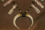 Unique “Big Man” Chief Tribal Boar Tusks & Ancestors’s Status Trophy,  Important Pectoral Ornament Worn during Initiations, also used as Currency, Bride Price, Feud Payments , collected in the late 1900’s in the Highlands Of Papua New Guinea