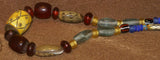 Rare Tribal Ethnic Dayak Iban Tribe Talisman Necklace: Antique Hand Crafted Magical Lukut Sekala , Old Trade Glass Beads, Amber beads, Buffalo Bone Hand Etched Beads, Shells, Chinese Coins, collected in 1980’s Borneo Aristocrat Owner, Indonesia. NB4