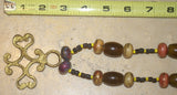 Borneo Tribal Oran Ulu, Dayak, Iban Tribe Heavy Brass Earring Talisman, Ear Weight Now Used as a Pendant for a Necklace with Large Amber Beads & Old Glass Trade Beads NB20