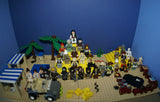 CUSTOM LEGO SET, PYRAMID RAIDERS ARCHEOLOGIC DIG WITH 33 NOW RARE RETIRED MINIFIGURES FROM ADVENTURES OF THE ORIENT EXPRESS & INDIANA JONES TEAM, SKELETONS, SNAKES SCORPIONS SPIDERS, 2 PYRAMIDS, OASIS, MANY ACCESSORIES 535 PCS (KIT 11) 20" X 10"