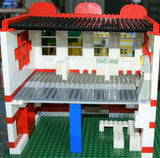 9 CUSTOM LEGO SETS (1911 pcs) WITH 58 NOW RARE RETIRED MINIFIGURES FROM LEGO TOWN (1978-2010). BUILDS: HOSPITAL, AMBULANCE, HELICOPTER, SUNSHINE CAFE, FLORIST, HOT DOG STAND, POST OFFICE, CRANE, POLICE VEHICLES, TRUCKS, ROAD, SO MANY ACCESSORIES (KIT 12)