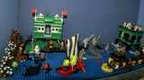 4 CUSTOM LEGO SETS "MISSION DEEP SEA COMPROMISED" (32" x 12") 1012 pieces, 36 NOW RARE RETIRED MINIFIGURES, 30 ANIMALS OR FISH, 3 RESEARCH CENTERS ON STILTS, POOL, DOCKS, BOATS, HOLDING TANKS, ROCKY SHORE, MANY ACCESSORIES (KIT 13)