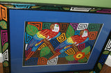 A Kuna Indian Folk Art Mola from San Blas Islands, in Custom Unique Hand Painted Signed Frame with  Blue Mat: Hand stitched Textile Applique: Colorful Macaw Parrot & Hibiscus Flowers, 23" x 18.5" (DFM19) Wall Decor