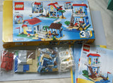 NOW RARE RETIRED LEGO CREATOR DREAM BEACH HOUSE 7346, 3 BUILDS INTO 1= CAN BE SEASIDE VILLA, BEACH HUT OR APARTMENTS SINCE THESE BUILDING BLOCKS  ALLOW MODIFICATIONS, SURFER MINIFIGURE, BOX AND INSTRUCTIONS INCLUDED (415 PIECES)  AGE 6-12, YEAR 2012