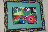 A Kuna Indian Folk Art Mola in Custom Frame, Glass & Double Mats. Hand-stitched Applique from San Blas Islands, Panama: Colorful Blue Water Fowl or Hen Swimming, Surrounded by Pink Flowers & Leaves 15" X 13" (DFM6) Wall Decor