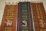 Hand woven Ceremonial Hinggi Sumba Songket Ikat Textile 55"x 13.75" created with symbolic animal motifs & geometrics. Tapestry is Hand spun Cotton, Dyed with Natural Pigments. Horse Motif Created with Hand sewn tiny Nassa Shells (SR39) rust red background